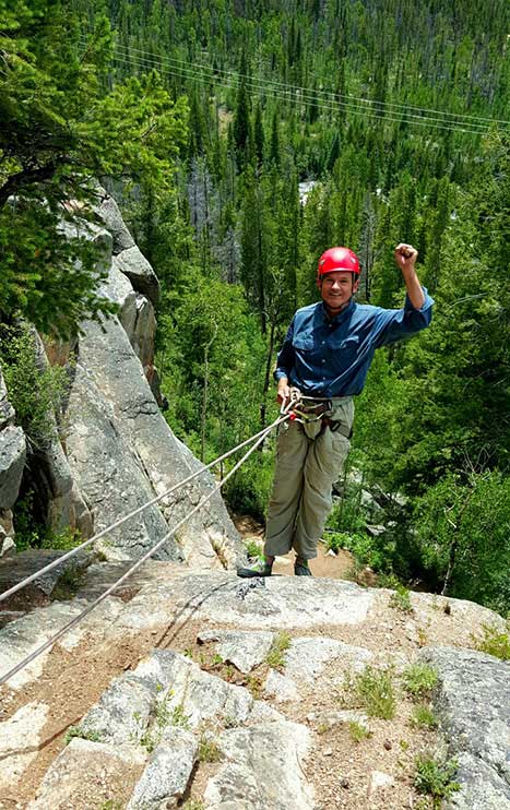 rock climber being lowered